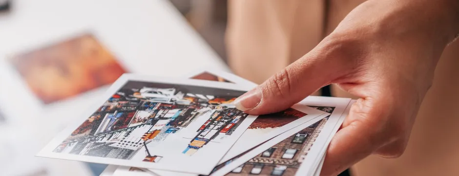 A stack of freshly printed photos