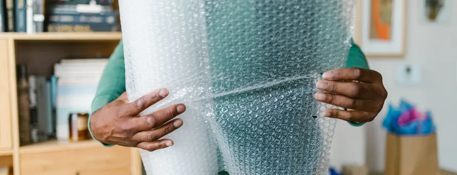 Wrapping an item in protective bubble wrap