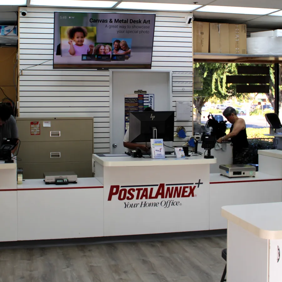 Passport photo and canvas print station at PostalAnnex Branham