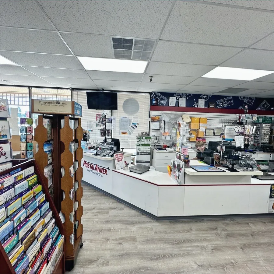 The service counter and retail floor inside PostalAnnex Tennant Station